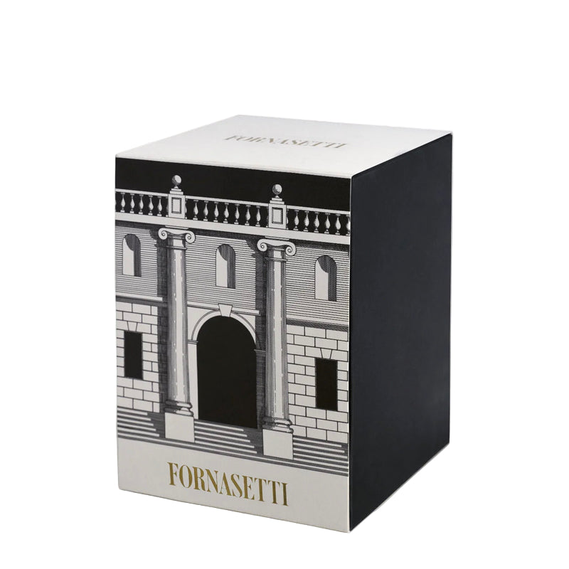 Fornasetti box with architectural design on a white background