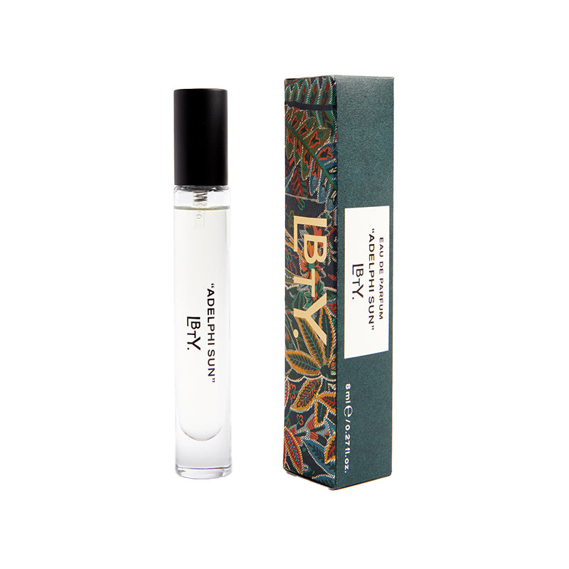 Perfume bottle 8ml and packaging with 'Adelphi Sun' branding on a white background by Liberty