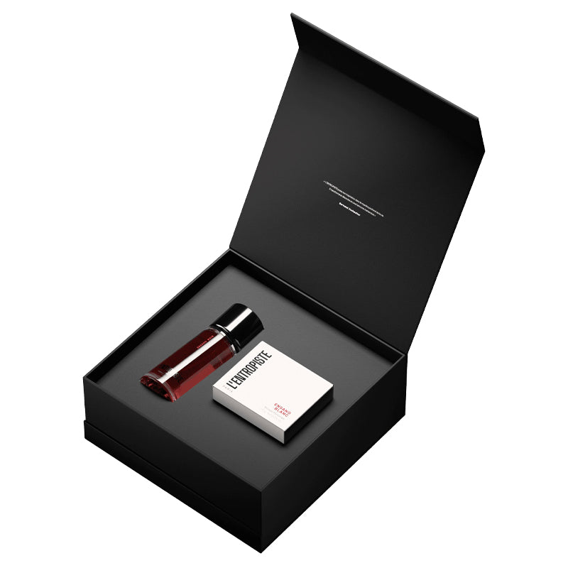 Black open box containing a small bottle and a card with 'Cerruti 1881' branding on a white background.