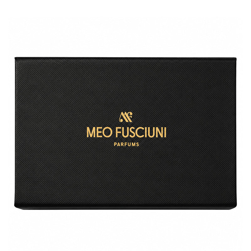 Meo Fusciuni discovery set in a black textured presentation case with gold logo.