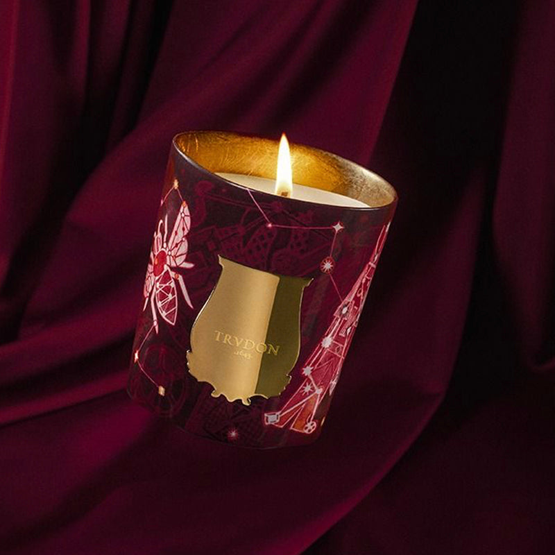 Nazareth Trudon candle with decorative packaging on a dark background