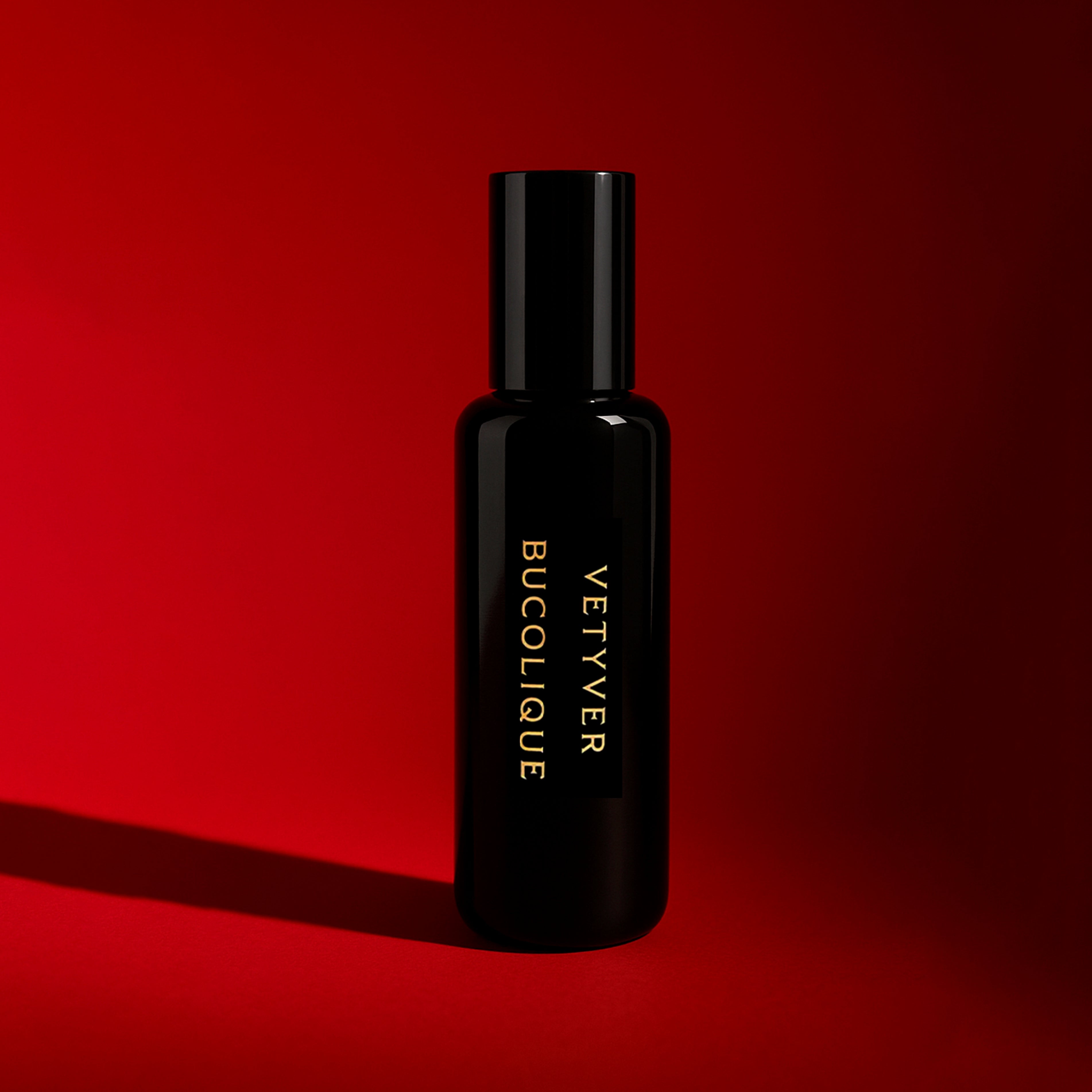 Black bottle of Vetyver Bucolique on a red background