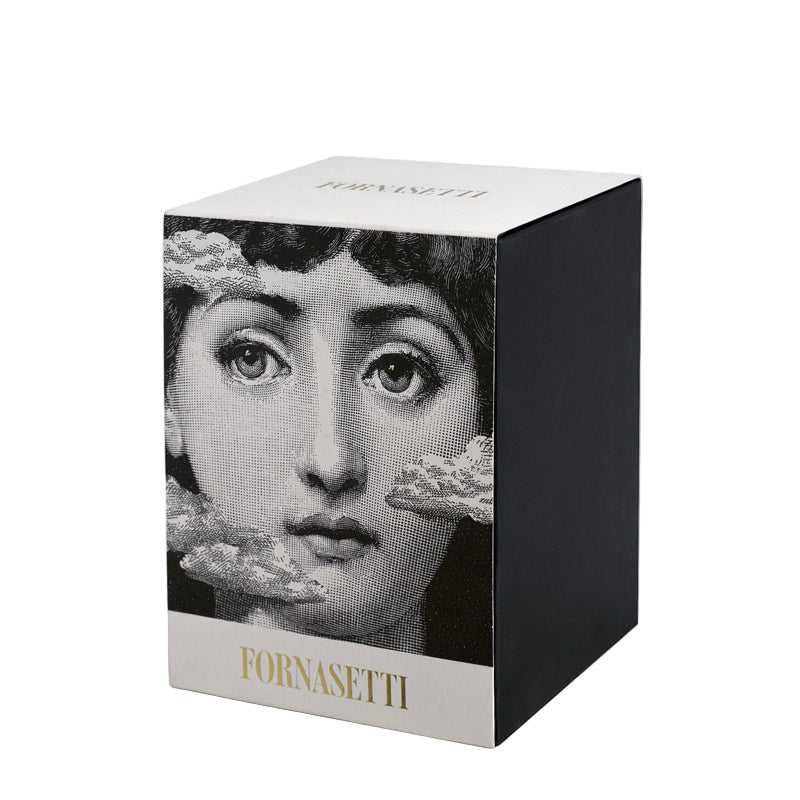 Fornasetti box with a black and white portrait design on a white background