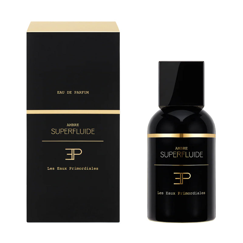 Black perfume bottle and packaging with gold accents on a white background. Ambre Superfluide EdP - Superfluide Collection | Les Eaux Primordiales

