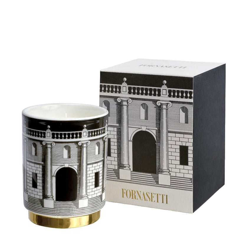 Fornasetti mug with decorative design and matching box on a white background