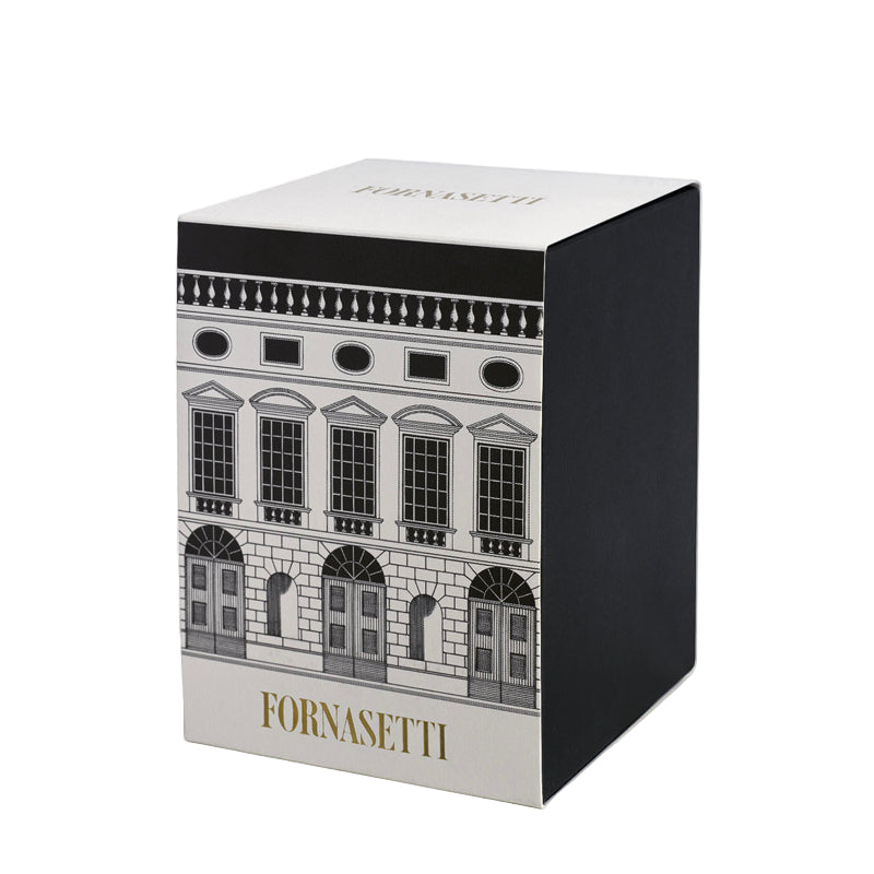 Fornasetti box with architectural design on a white background