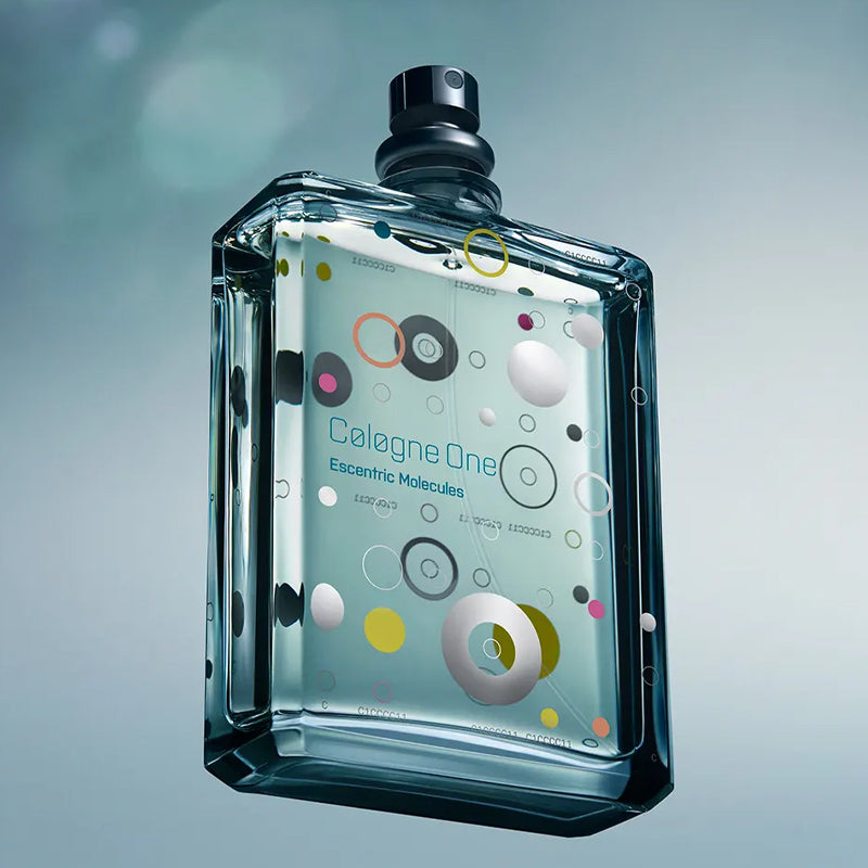 Perfume bottle with a colorful label on a gray background. 
Cologne One - Eau de Parfum 3.4oz  | Escentric Molecules | AEDES.COM