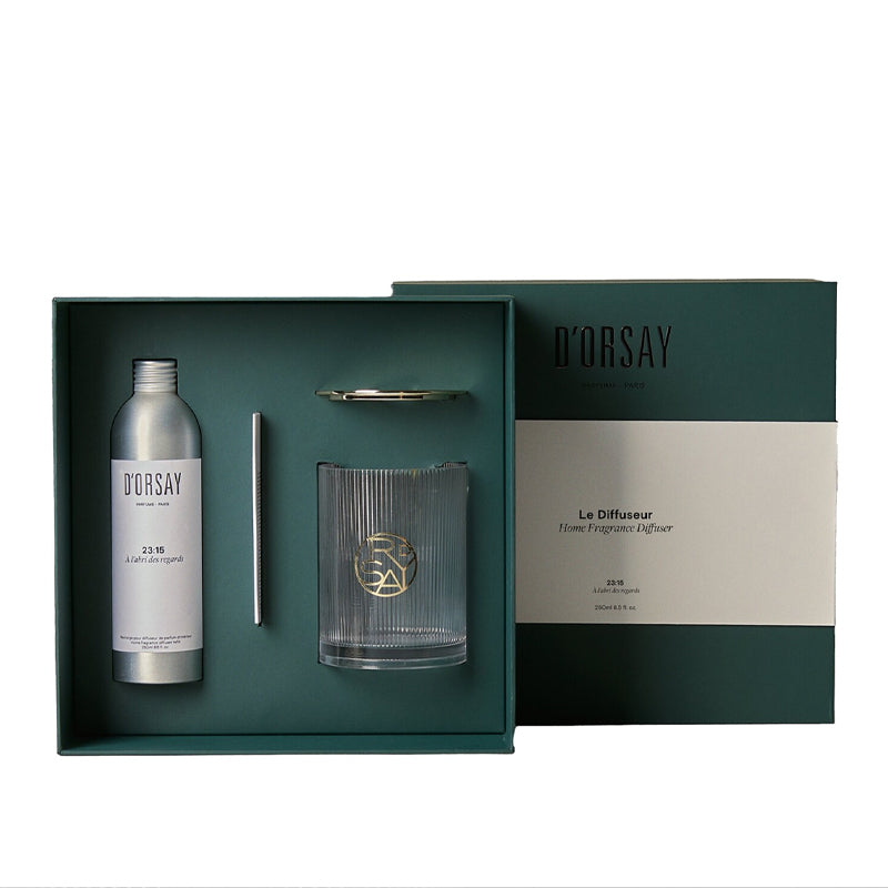Dorsay home fragrance diffuser set with bottle, glass, and pen in a box on a white background