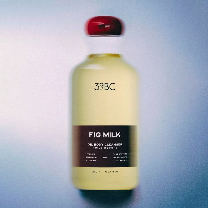 Bottle of 39BC Fig Milk Oil Body Cleanser on a gradient background