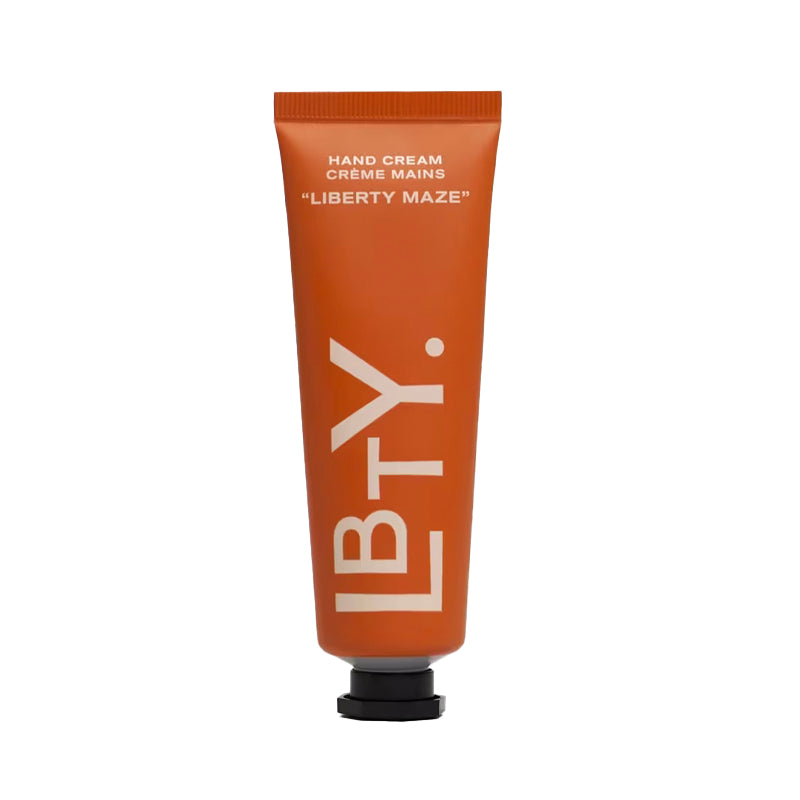 Hand cream tube labeled 'LBTY' on a white background. Liberty Maze - Hand Cream | Liberty Beauty | AEDES.COM