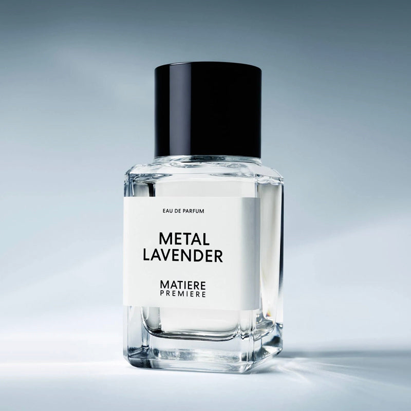 Perfume bottle labeled 'Metal Lavender' by 'Matiere Premiere' on a gradient background