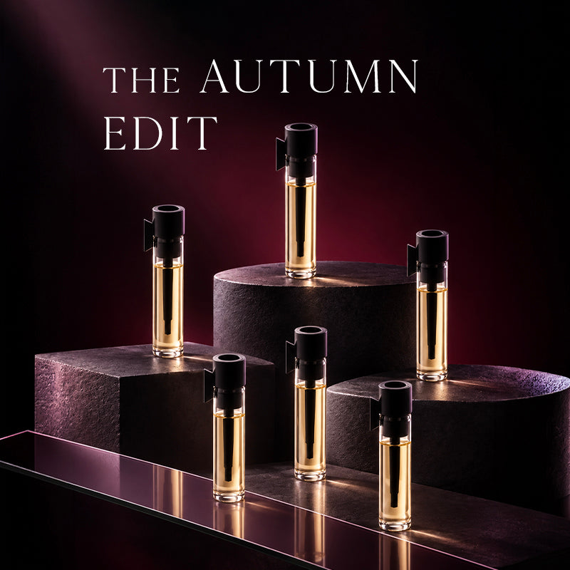 Six sample vials on burgundy background